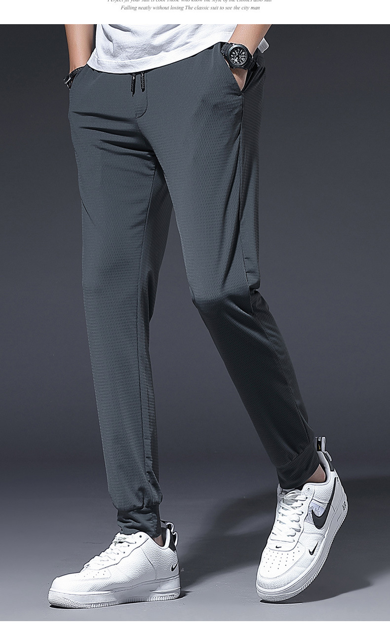 夏季薄款透气网眼冰丝休闲裤男装空调裤子男士小脚束脚运动户外