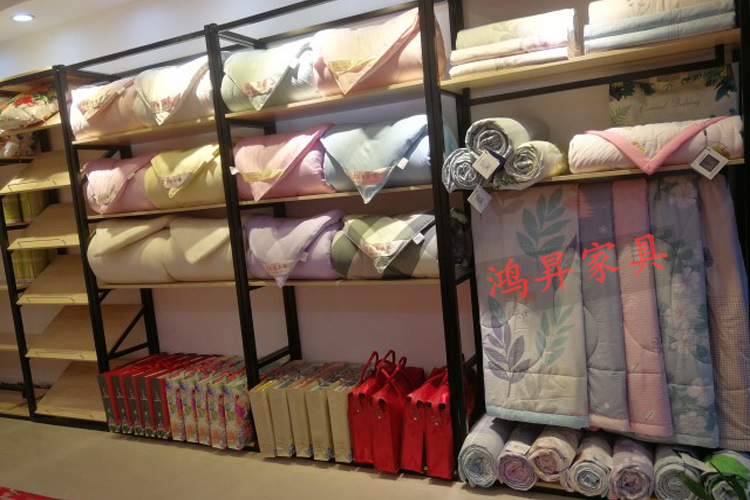 家纺店货架展示架喜庆床上用品展示柜四件套被子被芯枕芯布料展架