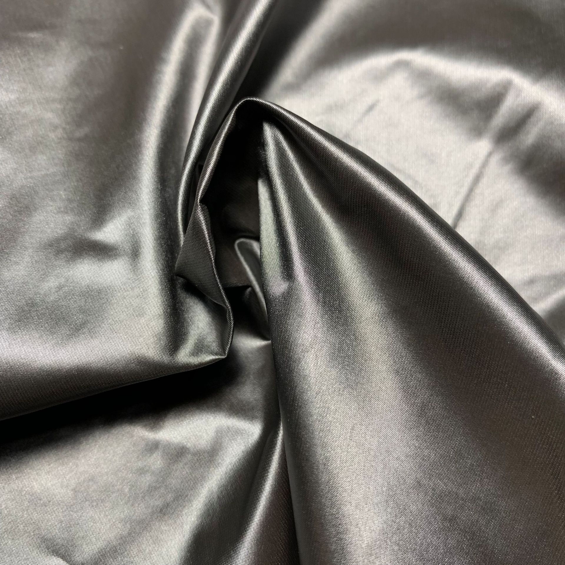 现货400t黑丝圆孔尼丝纺 无胆防绒黑丝圆孔双色尼丝纺羽绒服面料