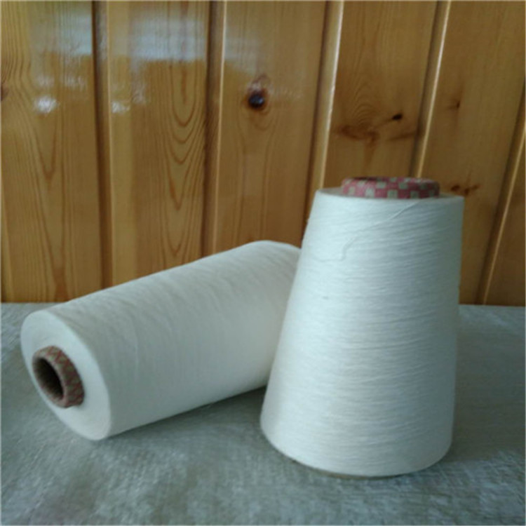 红华人棉包芯纱r4220d涤纶长丝现货生产人棉包芯纱42支