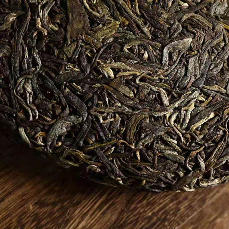 茶云南凤庆古树茶普洱茶生茶传统手工杀青357g七子饼源产地批发