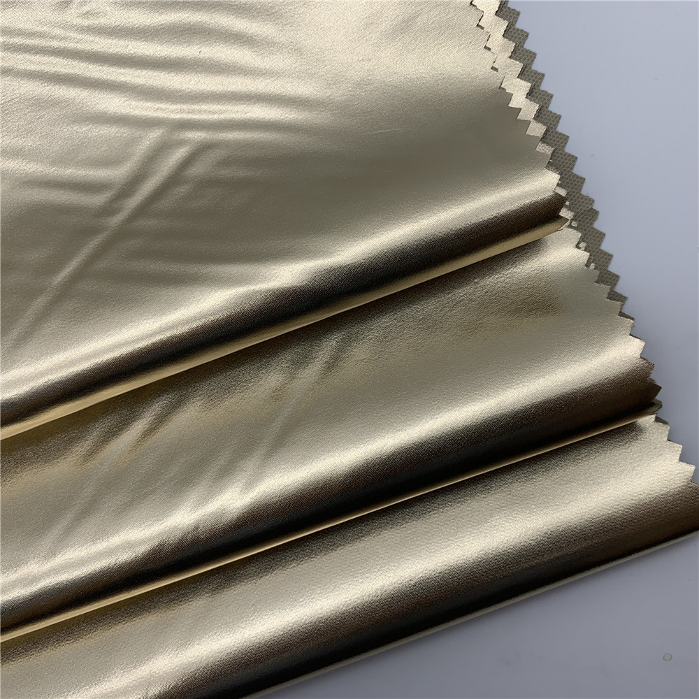 240t春亚纺贴膜烫金时尚面料 贴膜烫金面料儿童棉服羽绒服棉面料