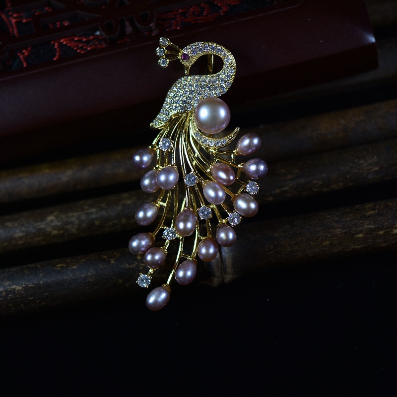 秋冬韩版衣饰天然淡水珍珠孔雀胸花源头工厂批发毛衣链胸针两用女