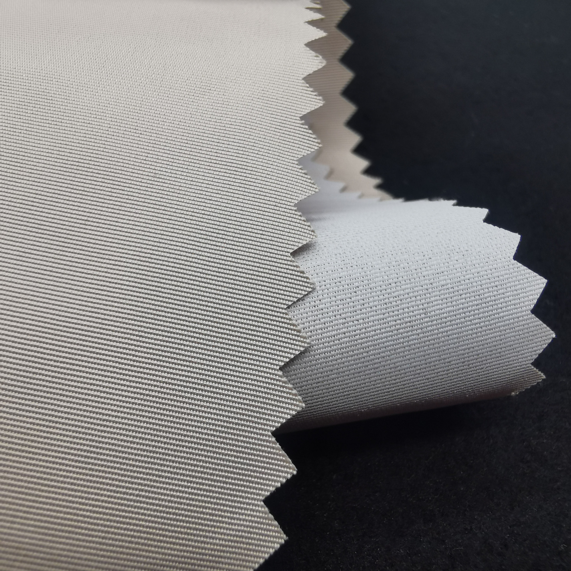 【厂家直销】三纬纺记忆 防绒涂白户外服冲锋衣面料