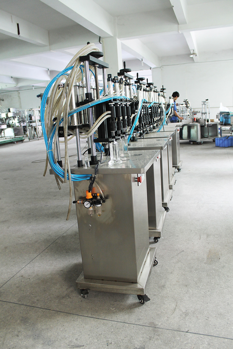 半自动负压灌装机香水灌装机化妆水灌装机液等位灌装气动灌装机