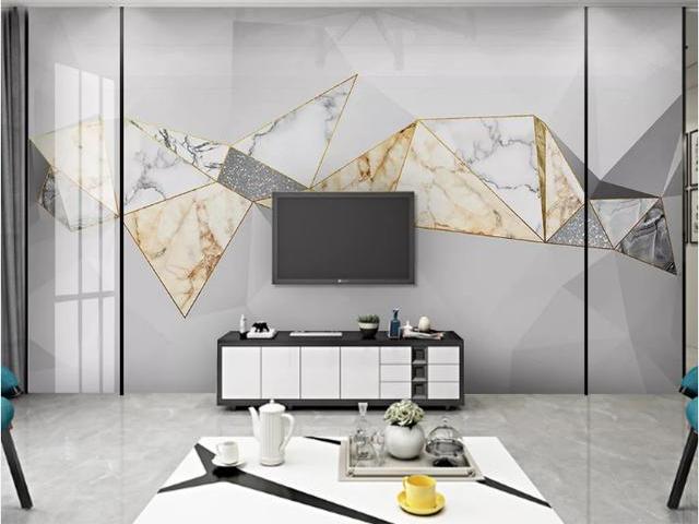 也是整个空间色彩的重心点,而几何背景墙的特点在于不同色块拼接带来