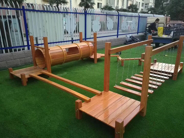 幼儿园户外玩具体能感统训练木质攀爬网架荡桥钻洞滑梯组合器材