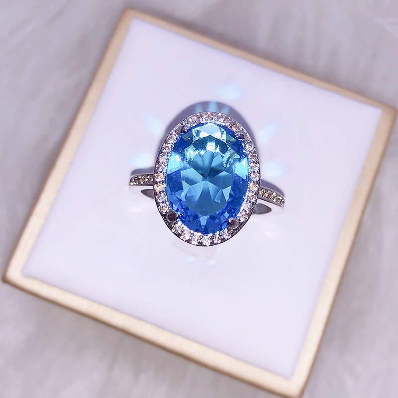 莫桑石高端花朵蛋形椭圆形蓝宝石戒指女镶嵌锆石活口指环手饰品
