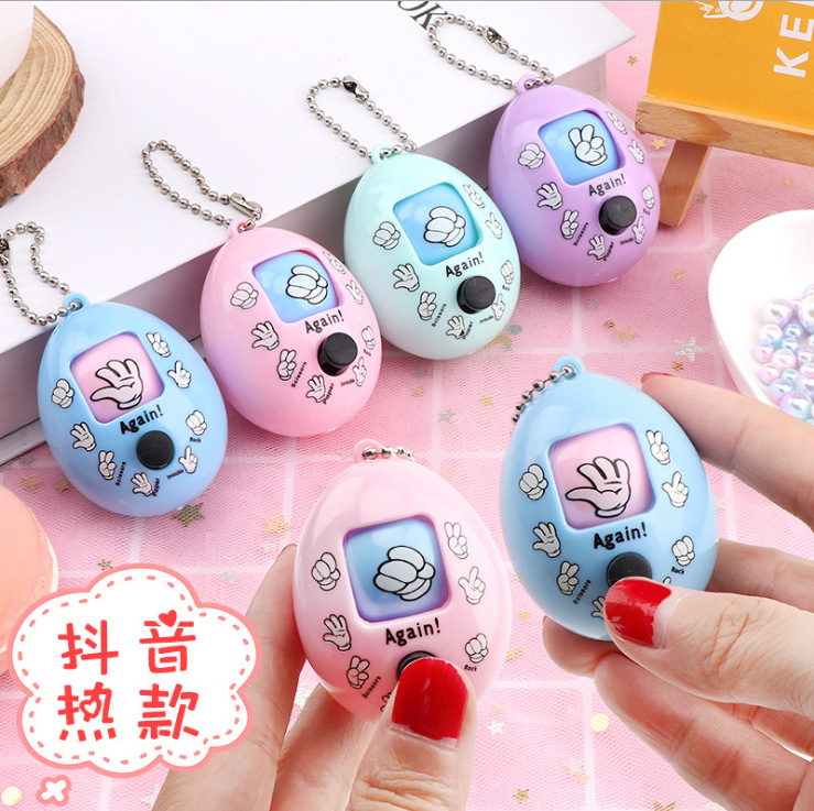 manufacturers wholesale tiktok style guessing boxing egg stone scissors cloth game egg rowing egg keychain pendant novelty toys