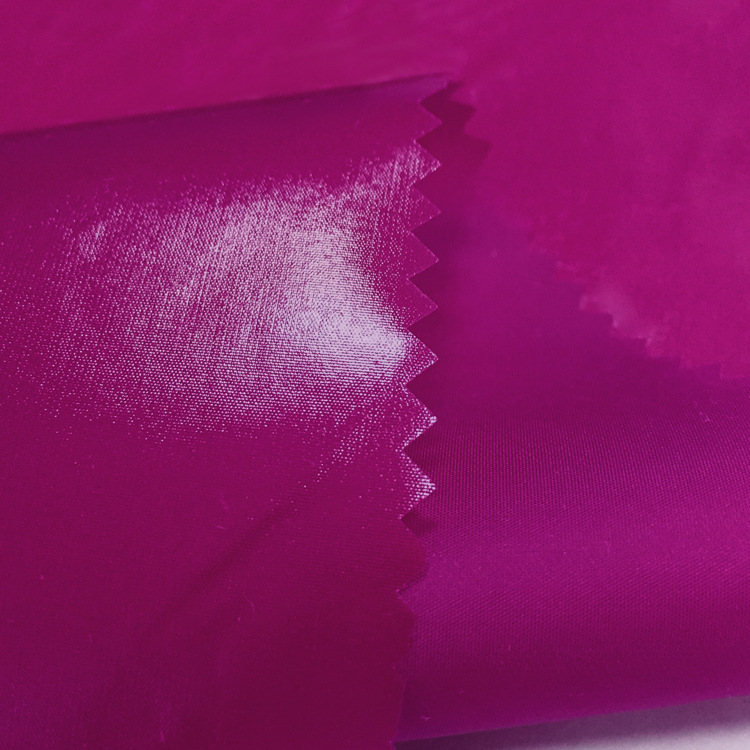 亮面羽绒服面料【40d亮pu】高档超级防水免洗亮皮漆皮防绒布