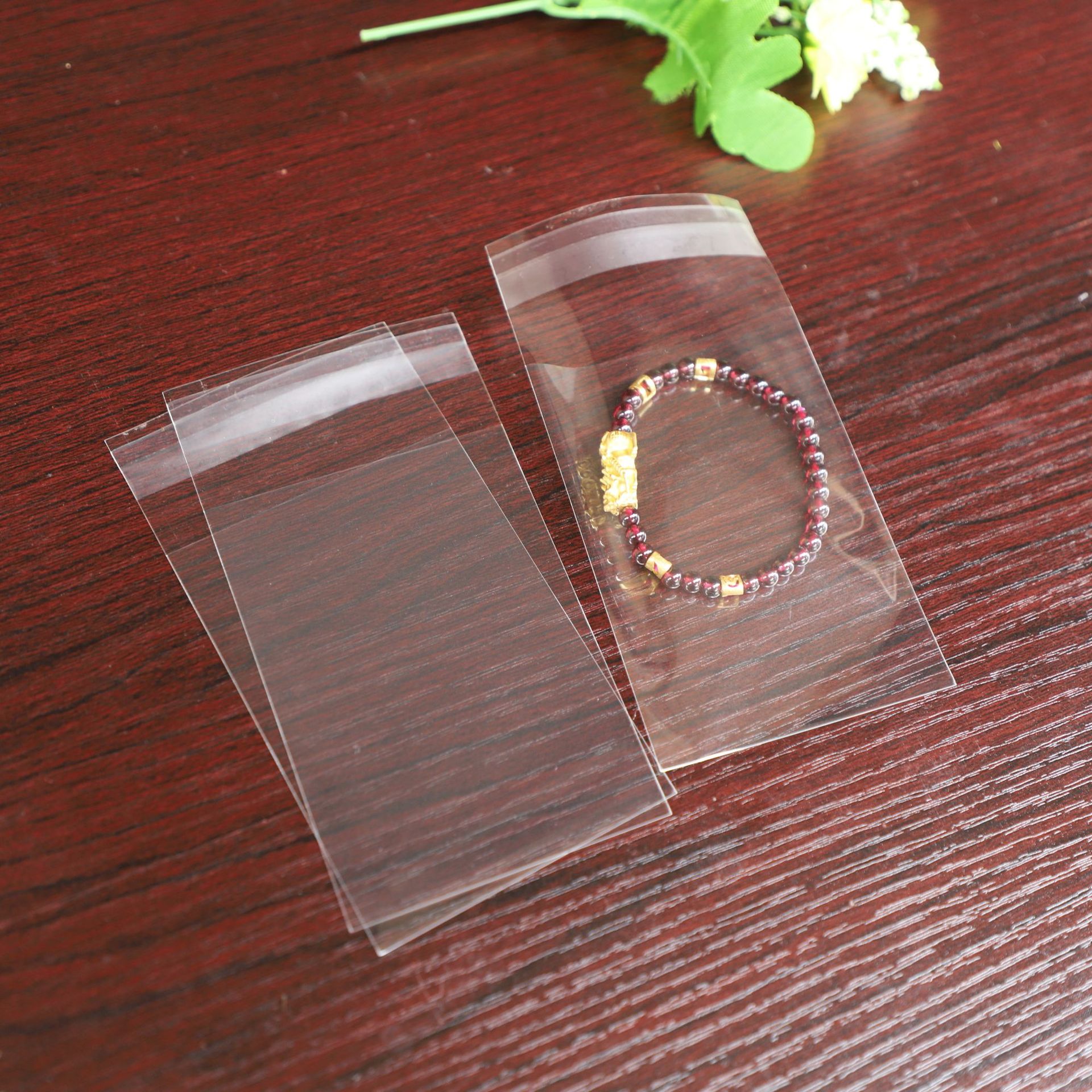 厂家现货opp透明袋化妆品饰品小号塑料袋5*9透明不干胶自粘袋定制