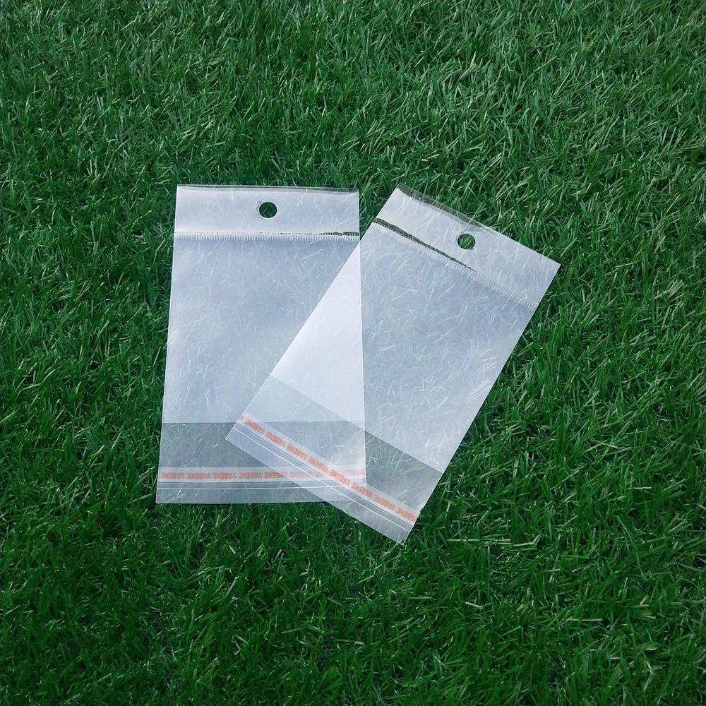 现货批发卡头挂孔opp袋子耳环饰品包装袋 玩具包装不干胶自粘胶袋