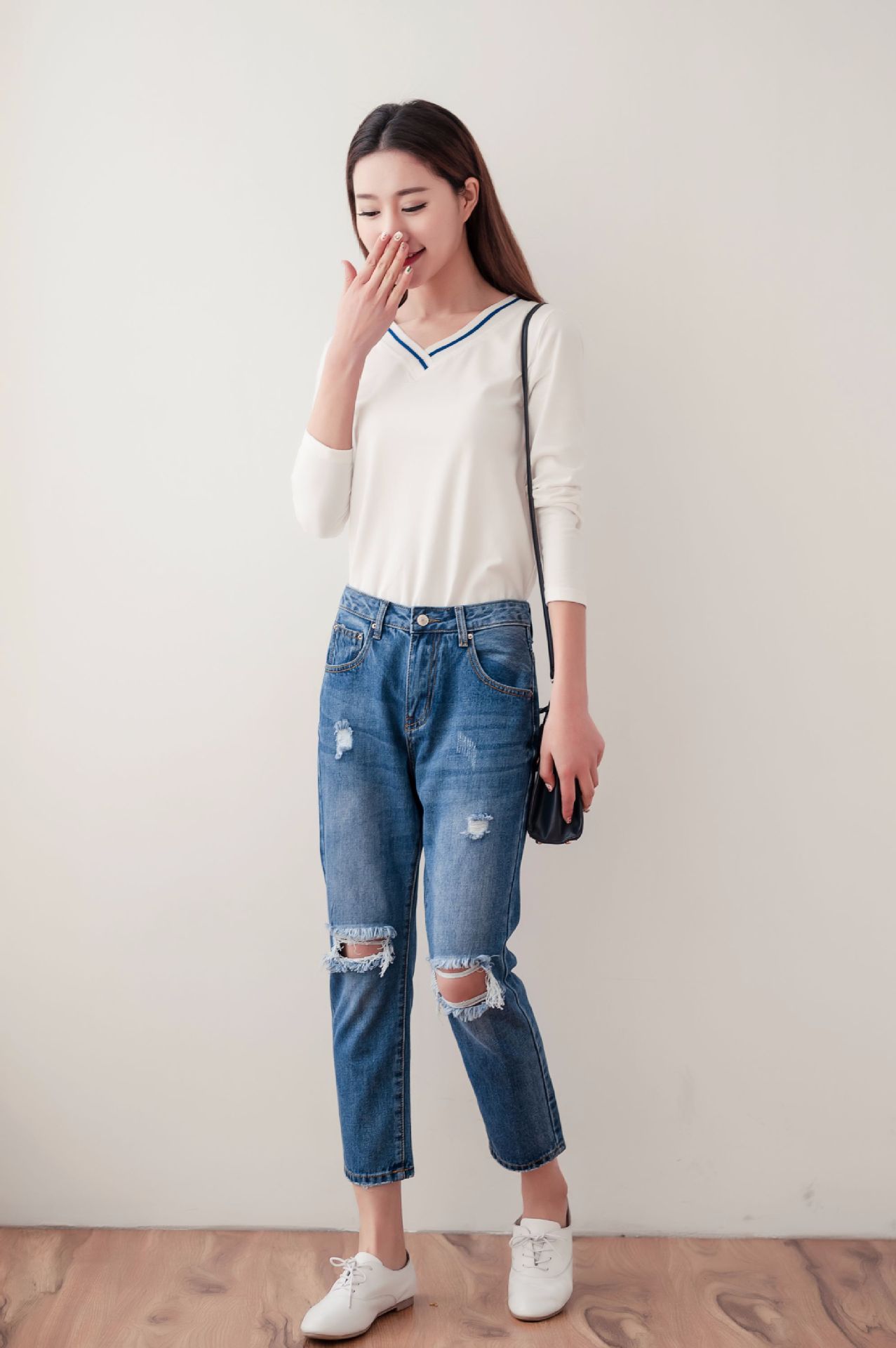 现货供应韩版女士宽松九分裤 春夏季时尚百搭破洞牛仔裤卷脚裤