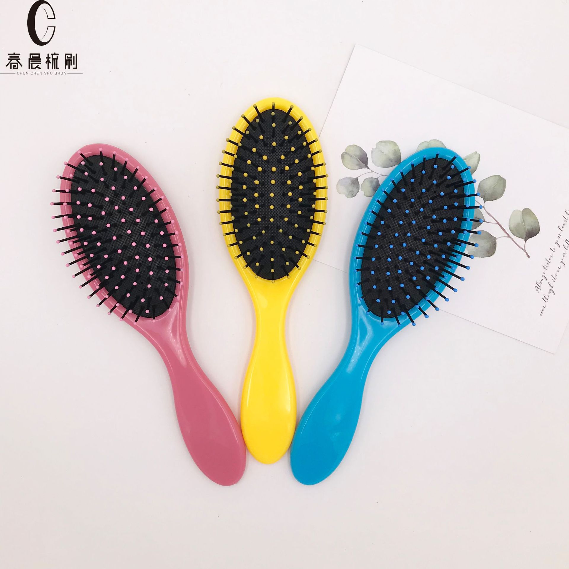 现货批发尼龙齿气囊梳塑料按摩纯色梳子家用美发造型梳