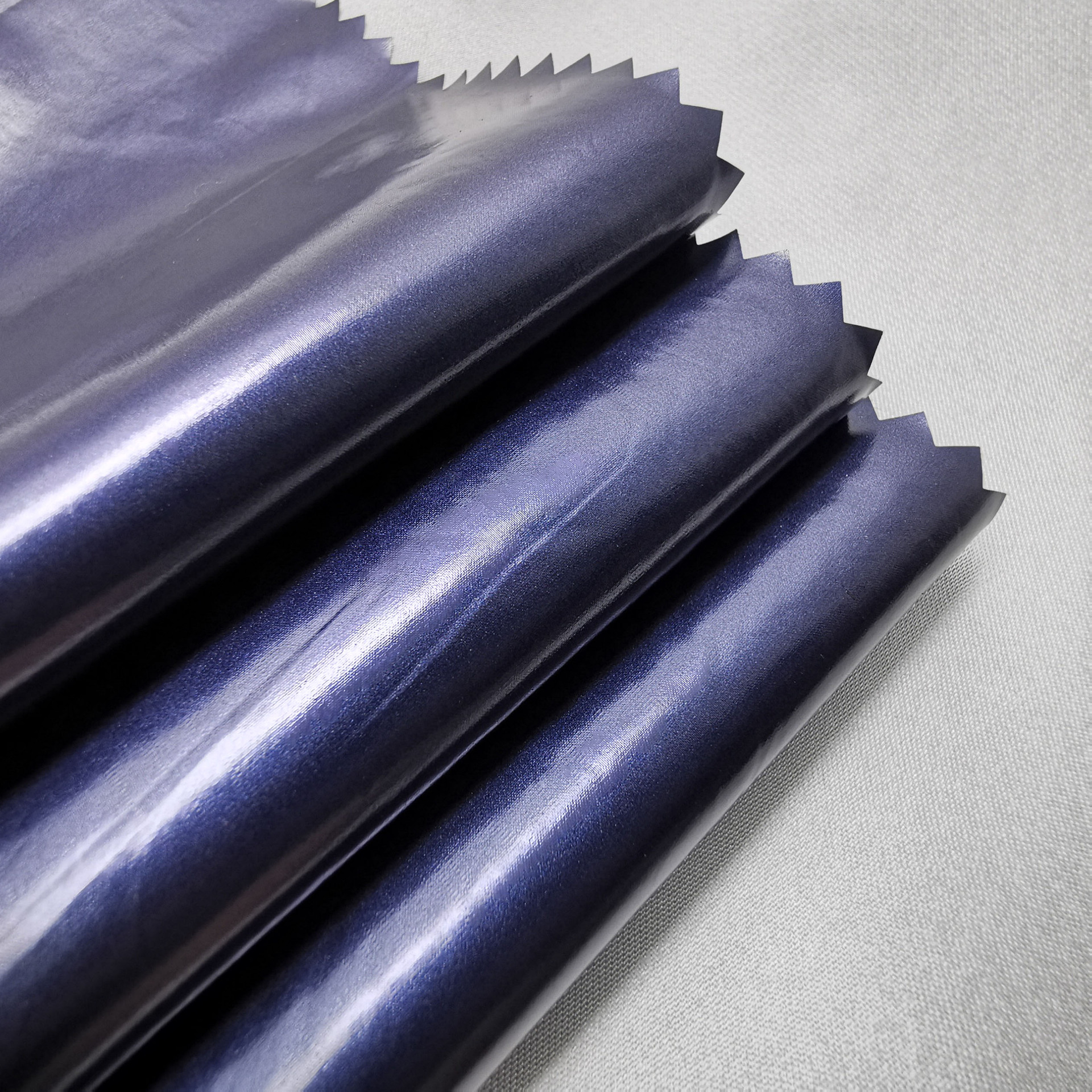 【厂家直销】400t消光尼丝纺 蓝色珠光涂层无胆防绒羽绒服面料