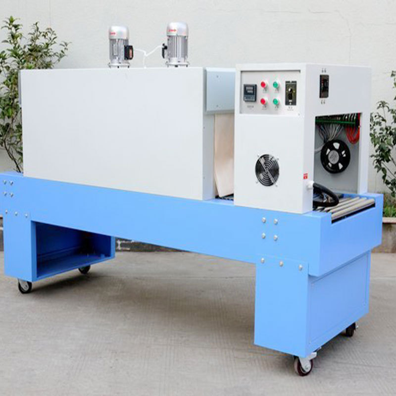 厂家现货济南玻璃水瓶裹包机 饮料瓶塑包机 pe自动收缩包装机