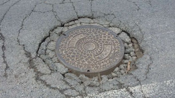 市政通路井盖下沉质量通病及施工方案改进