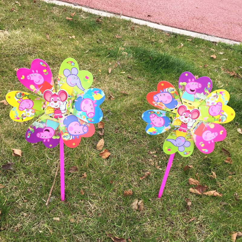 卡通小猪七彩塑料风车幼儿园装饰地摊通地摊玩具户外风车礼品批发