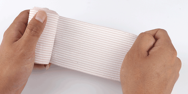 厂家直供 肤白色高弹性绷带抽纱80克/平方米医用弹力绷带包扎固定