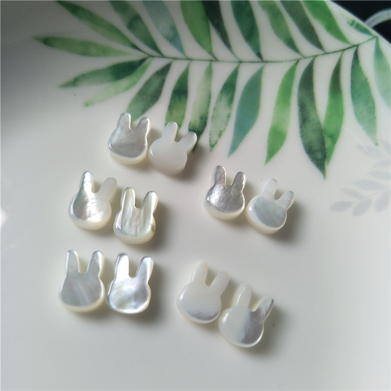 天然蝶贝打磨兔子头形 厂家直销粉贝散珠手链手工diy贝壳配件