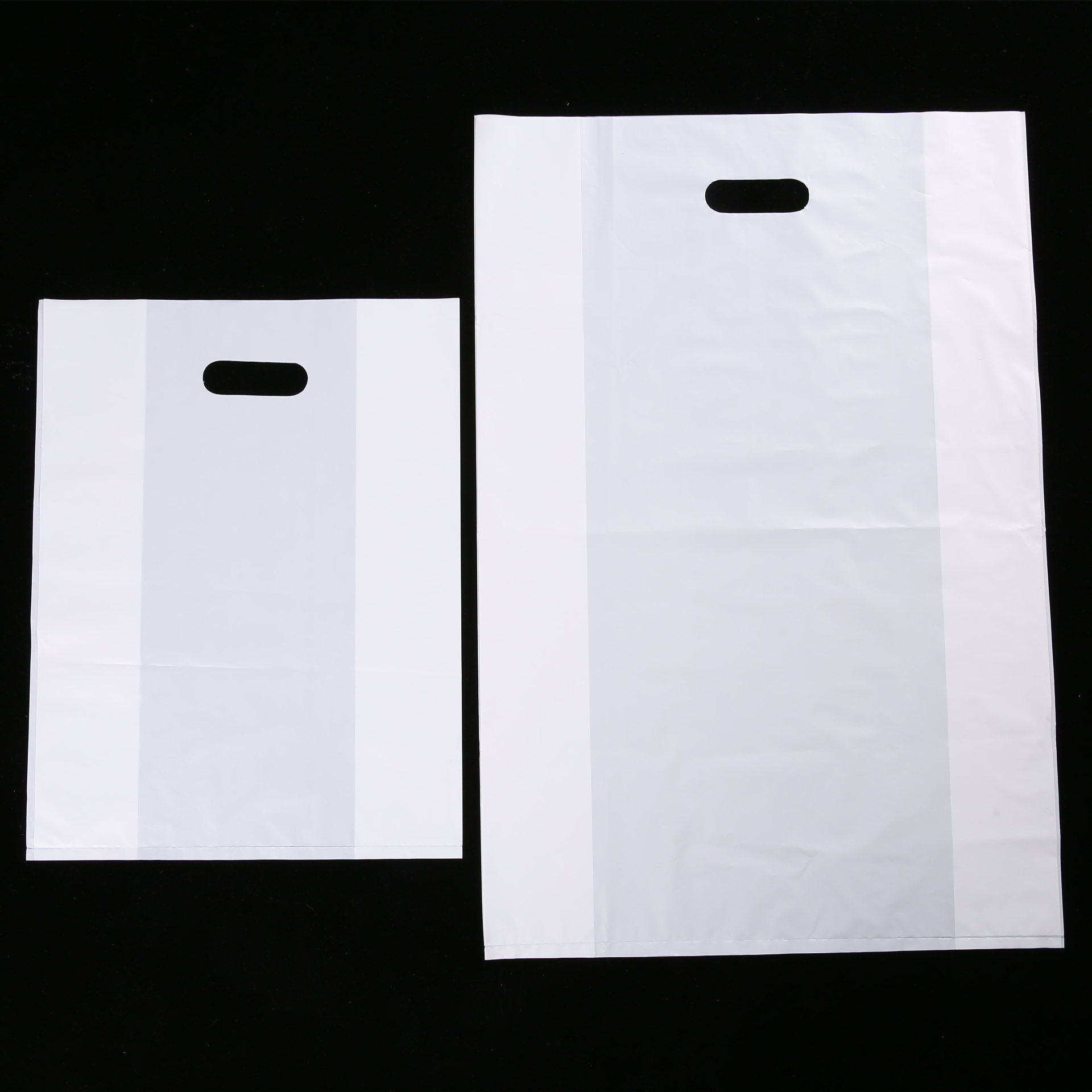 厂家定制 pe塑料手提袋购物袋服装冲孔平口袋胶袋设计印刷logo-阿里巴