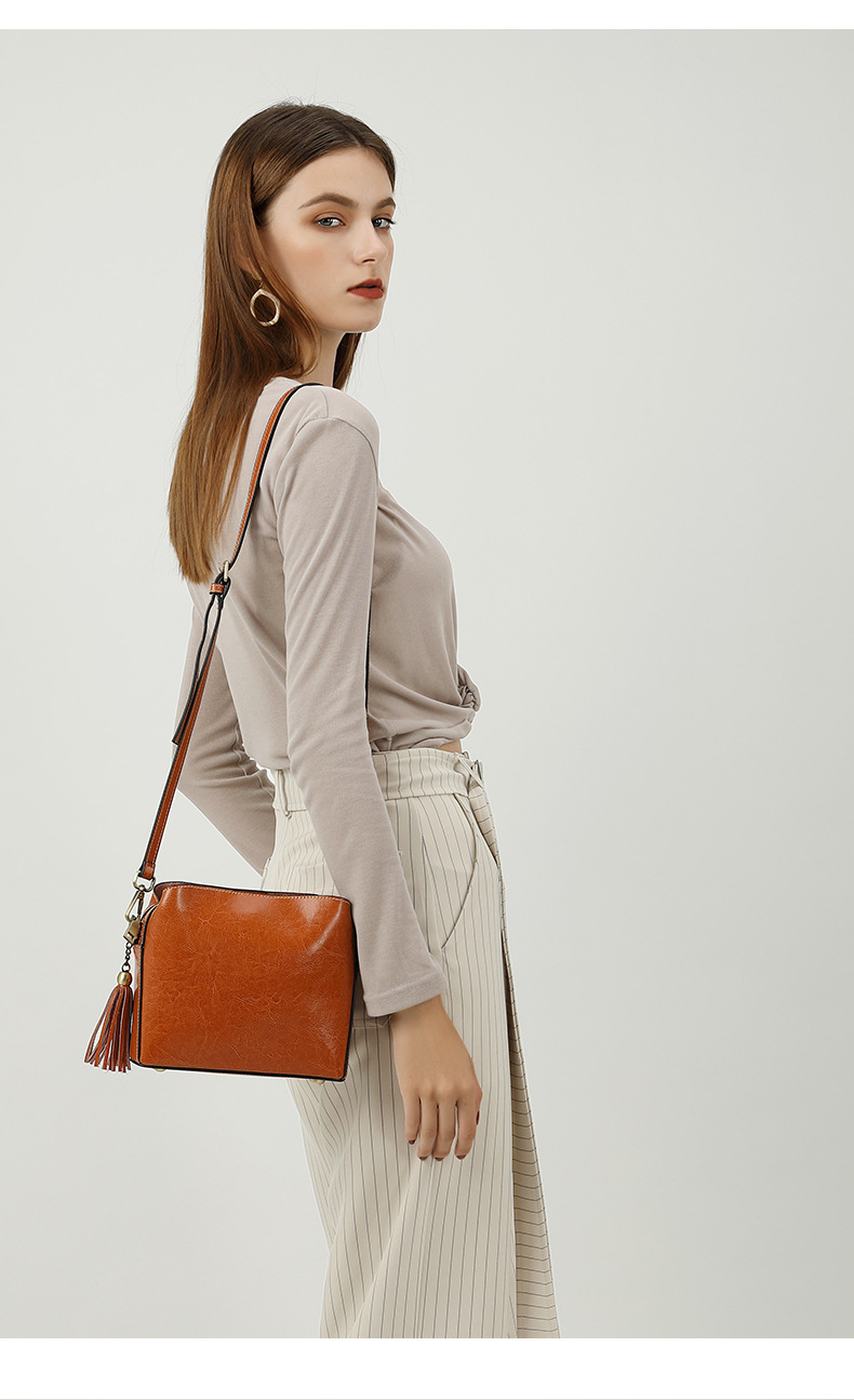 kimo女士包包女2019新款潮春夏简约流苏百搭斜挎单肩手提牛皮女包