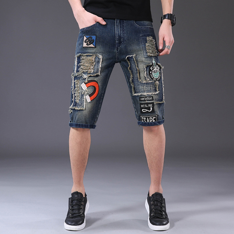 牛仔破烂短裤图片