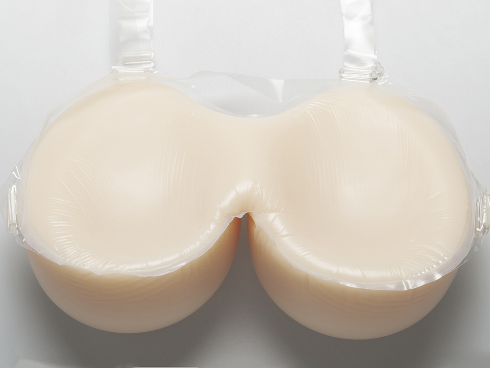 供应亚马逊 男女通用水滴形连体硅胶义乳 伪娘cd变装假胸假乳房