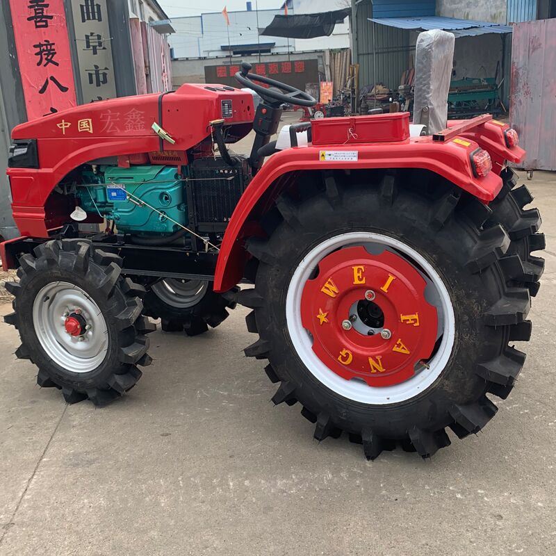 504四轮拖拉机图片 单杠矮架四轮旋耕除草机 大棚王四轮旋耕机