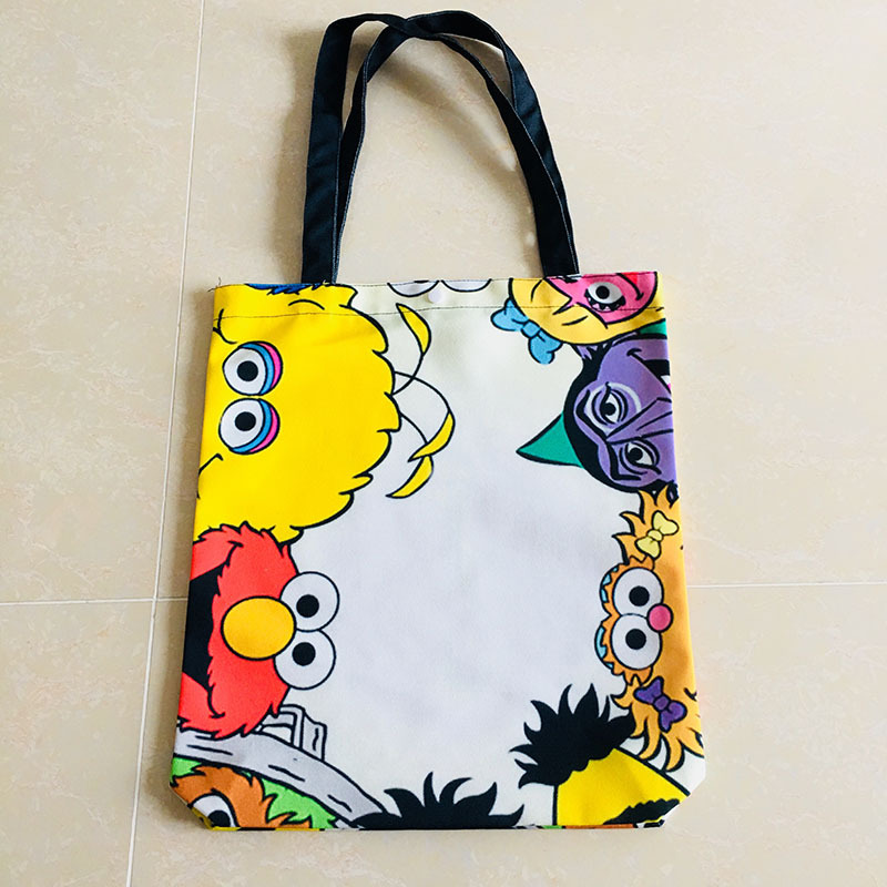 芝麻街 动漫卡通单肩帆布包休闲可爱学生书包手提袋购物袋休闲袋