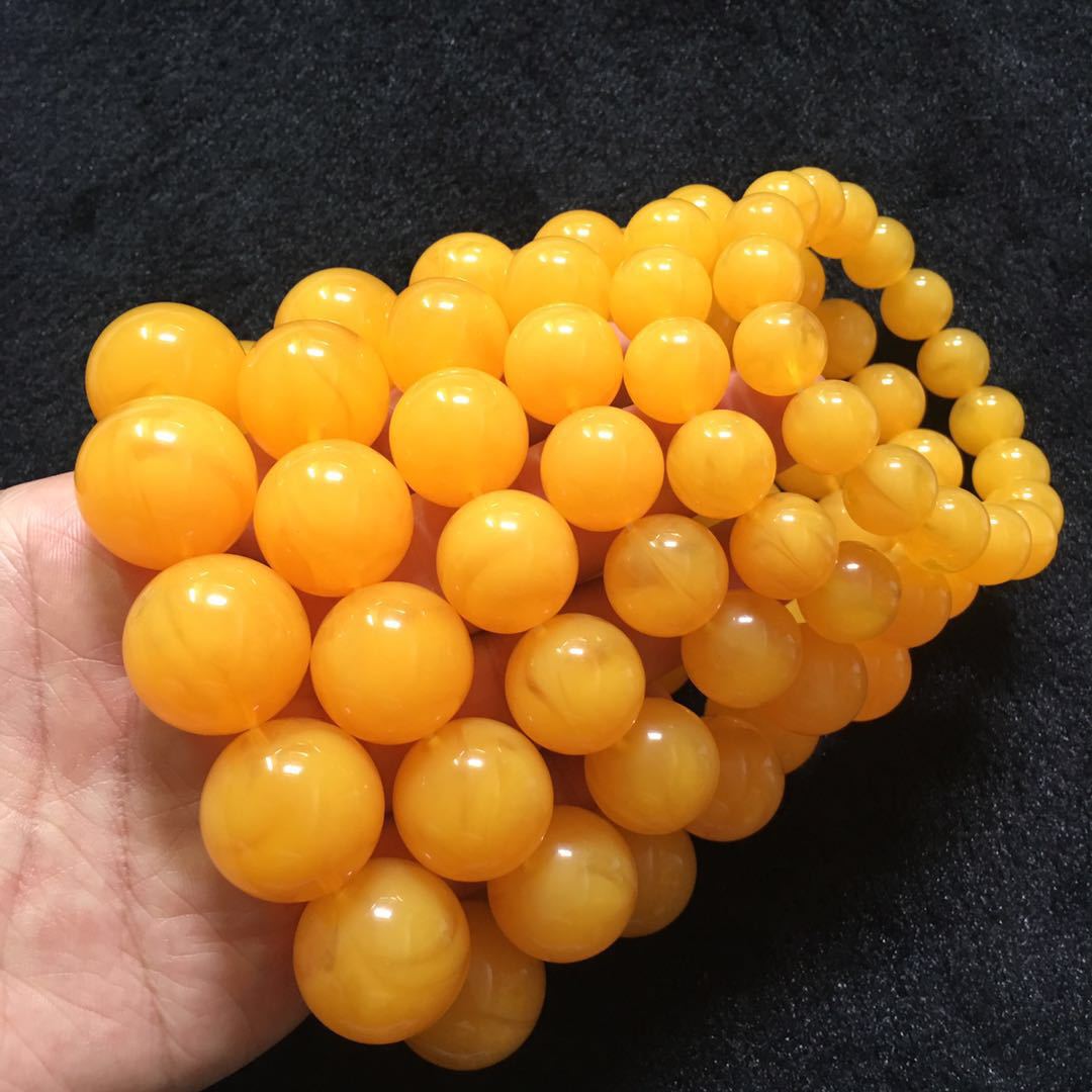 跑江湖展销直播二代琥珀蜜蜡浮水荧光鸡油黄飘花精品圆珠桶珠手串