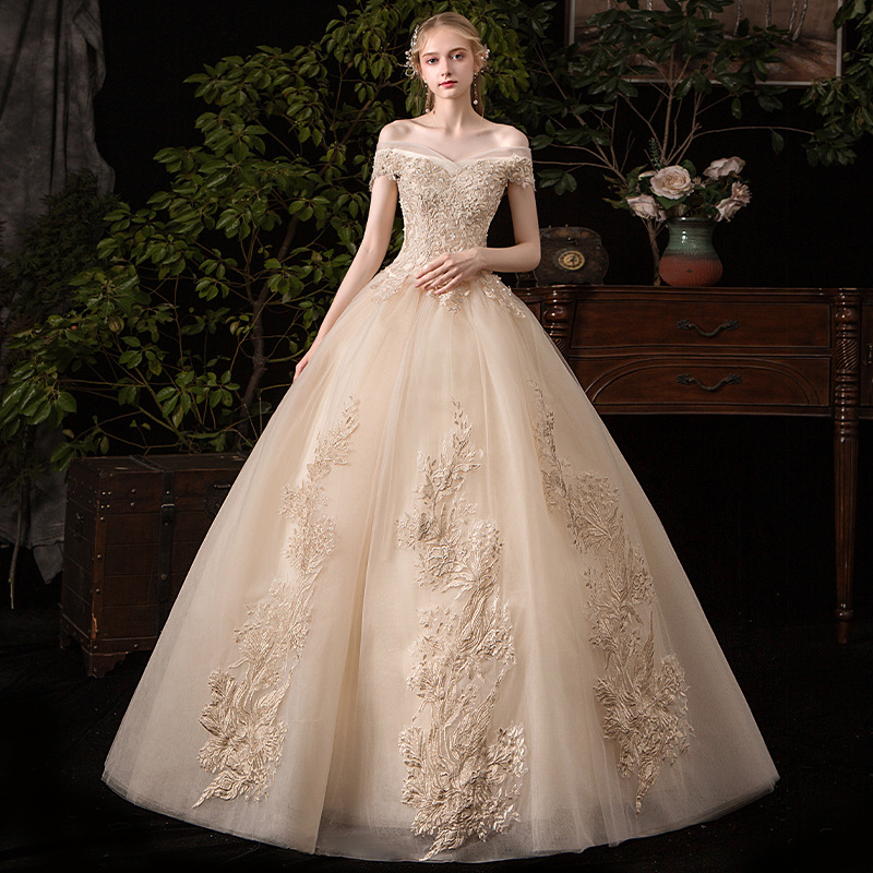 婚纱礼服2020新款新娘一字肩韩式金色蕾丝花纹影楼拍照气质蓬蓬裙