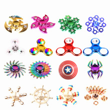 100多款指尖陀螺炫彩金属玩具 钢珠塑料发光手指陀螺解压地摊玩具