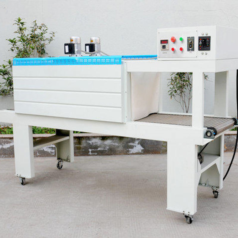 厂家现货济南玻璃水瓶裹包机 饮料瓶塑包机 pe自动收缩包装机