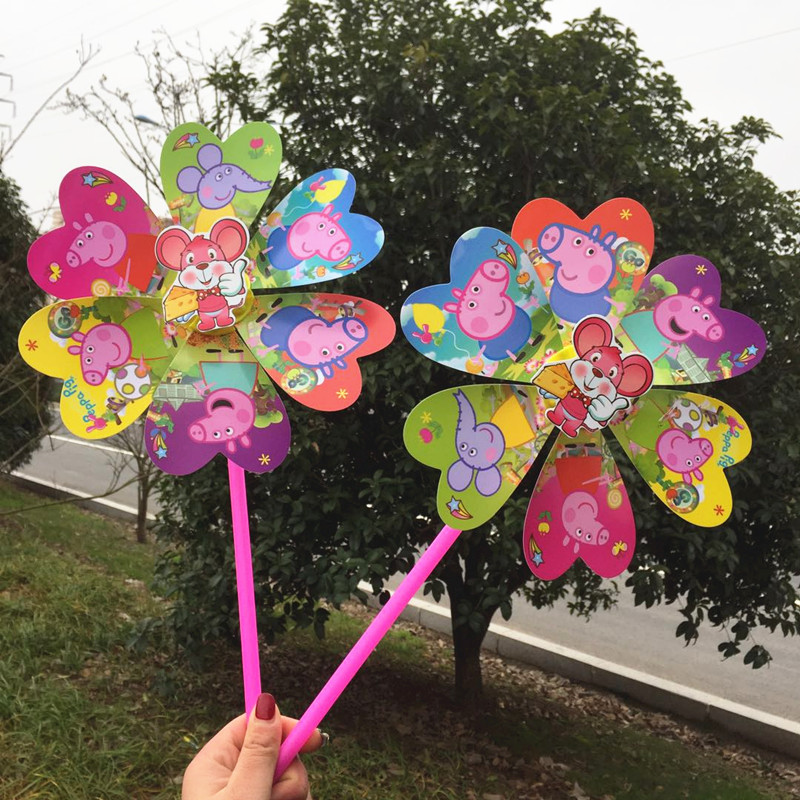 卡通小猪七彩塑料风车幼儿园装饰地摊通地摊玩具户外风车礼品批发