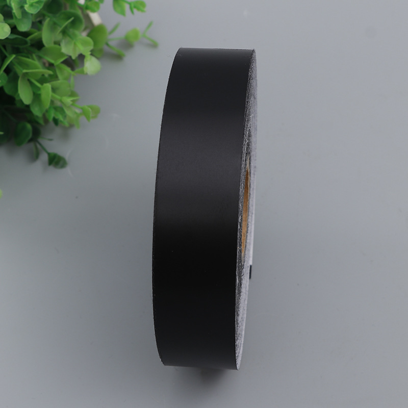 厂家供应水洗唛黑色缎布不干胶纺织辅料服装鞋子通用厚双胶底纸