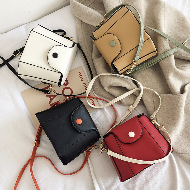 包包女ins秋冬小清新简约网红斜跨包单肩水桶包拼接小包百搭韩版