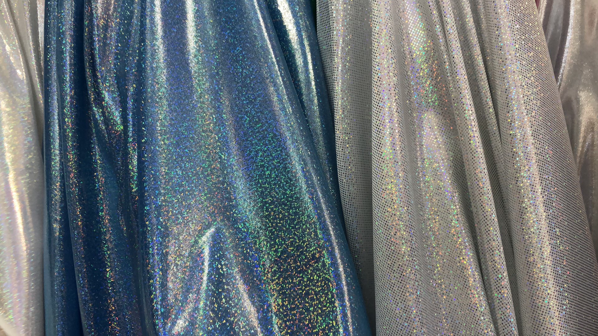 烫金镭射星空布料幻彩布七彩指纹点玩具 服装包装 装饰人造革现货