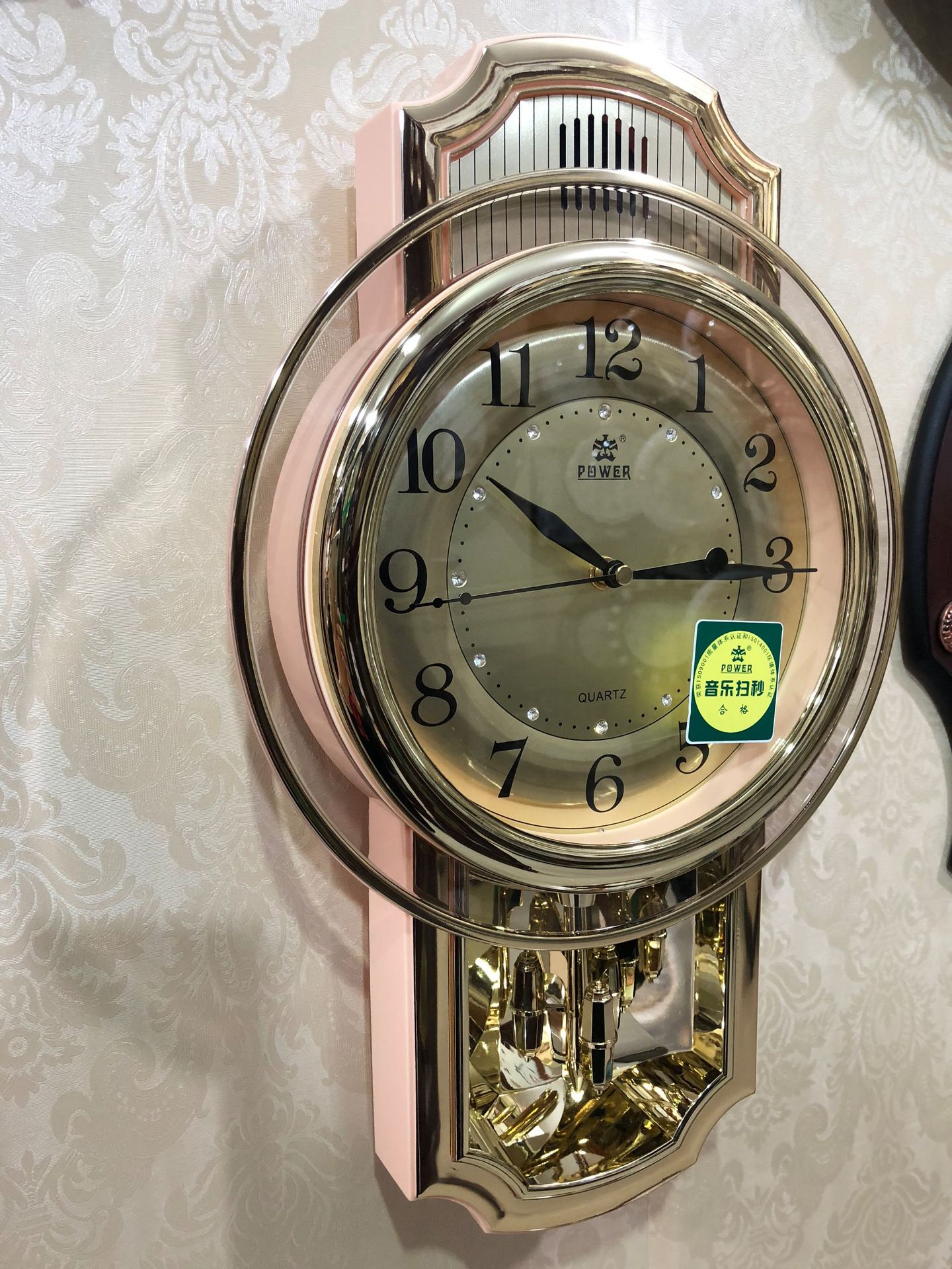 霸王音乐报时石英钟客厅挂钟挂表家用转摆卧室创意时钟表