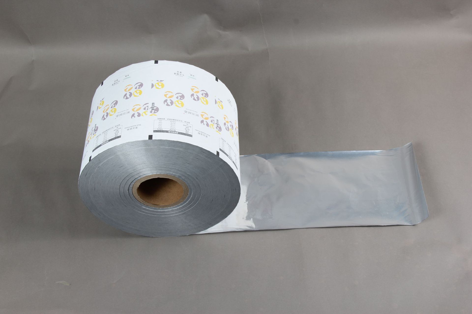 定制纸铝塑复合食品包装卷膜豆粉饮料冲剂自动包装机卷料纸袋