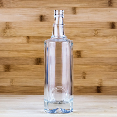 厂家生产500ml牙口圆瓶底部五星花纹透明玻璃瓶 高档一斤装白酒瓶