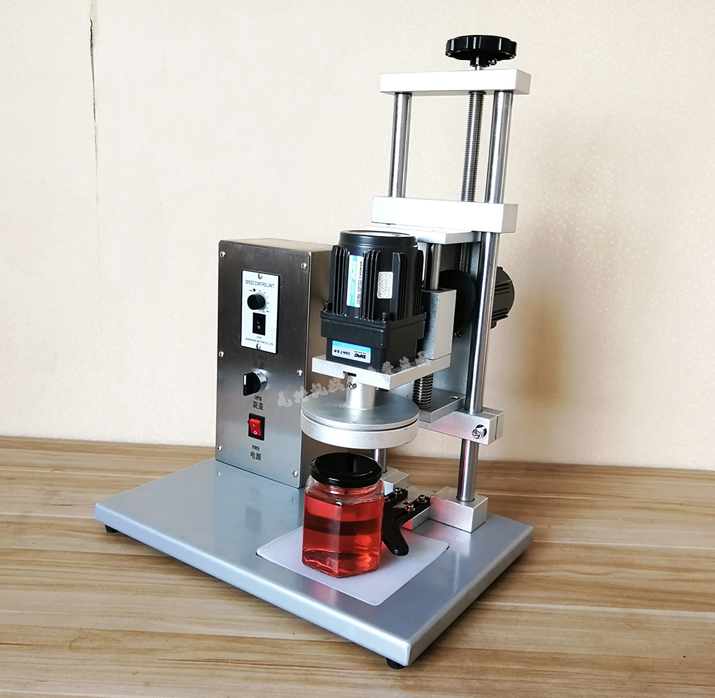 批发供应ddx-450型辣椒酱罐头瓶旋盖机 水果罐头铁盖旋盖机封盖机