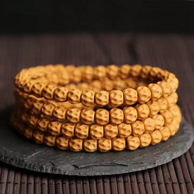 精品百香籽热辰寺108颗手工雕刻鬼脸藏式老树百香果菩提佛珠手链