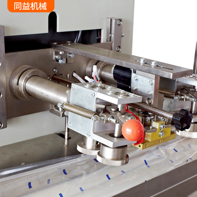 多功能大枣海苔糕点枕式包装机 全自动下走膜枕式包装设备包装机