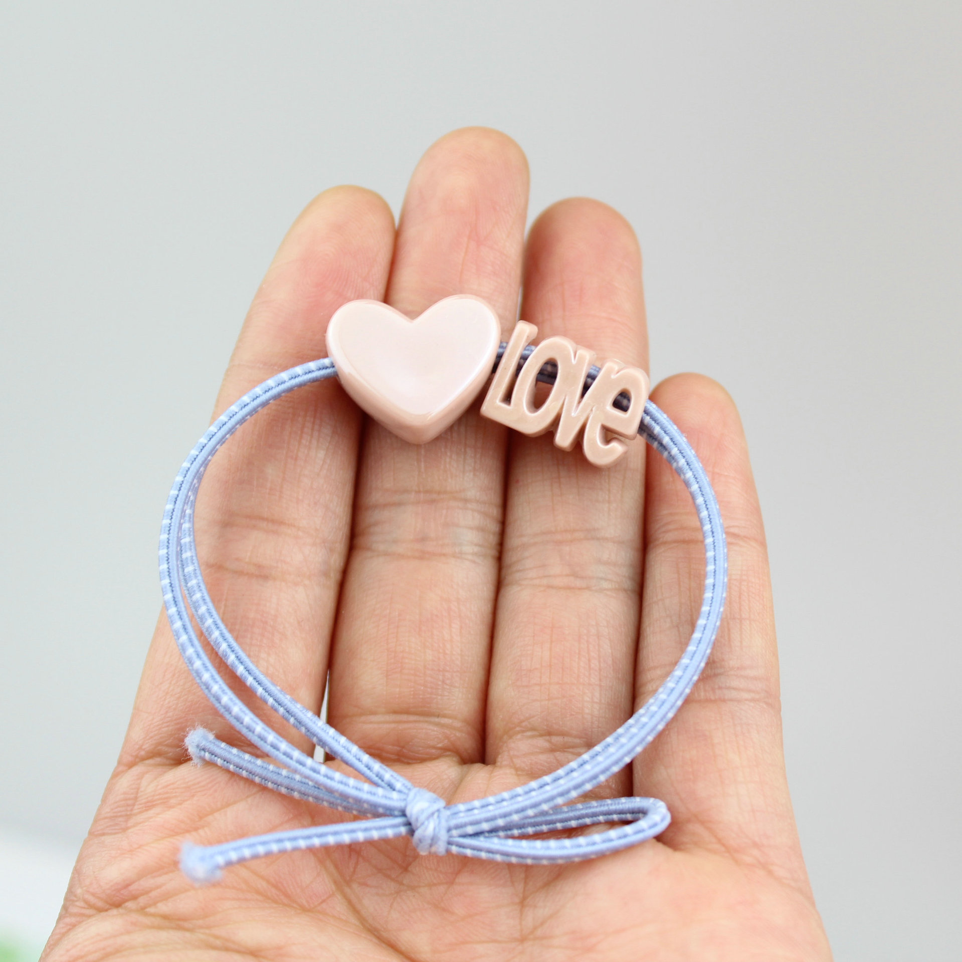 厂家批发2元店饰品韩版发饰头饰2019新款双线打结love桃心皮筋