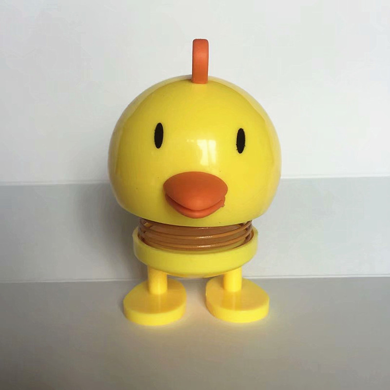 新款弹簧公仔摇头汽车摆件网红可爱创意车载内饰笑脸公仔摇头玩具