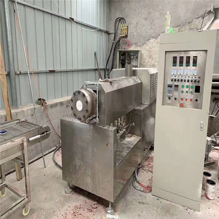 转让二手膨化机6575双螺杆膨化机膨化饲料颗粒机水产饲料颗粒机