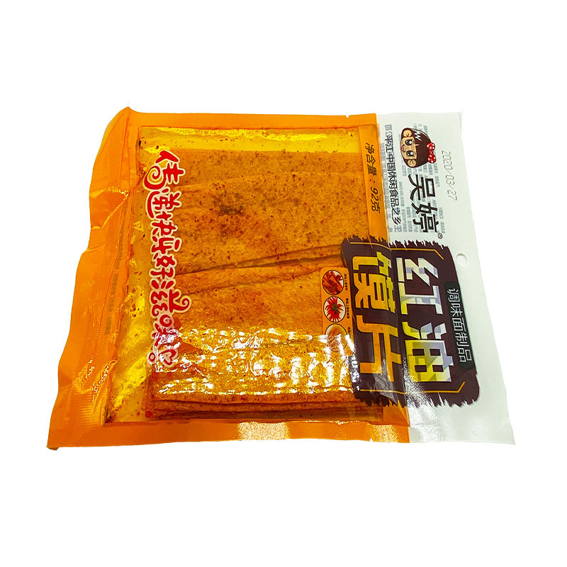 食品批发 吴婷红油馍片82g休闲麻辣零食辣片 辣条混批