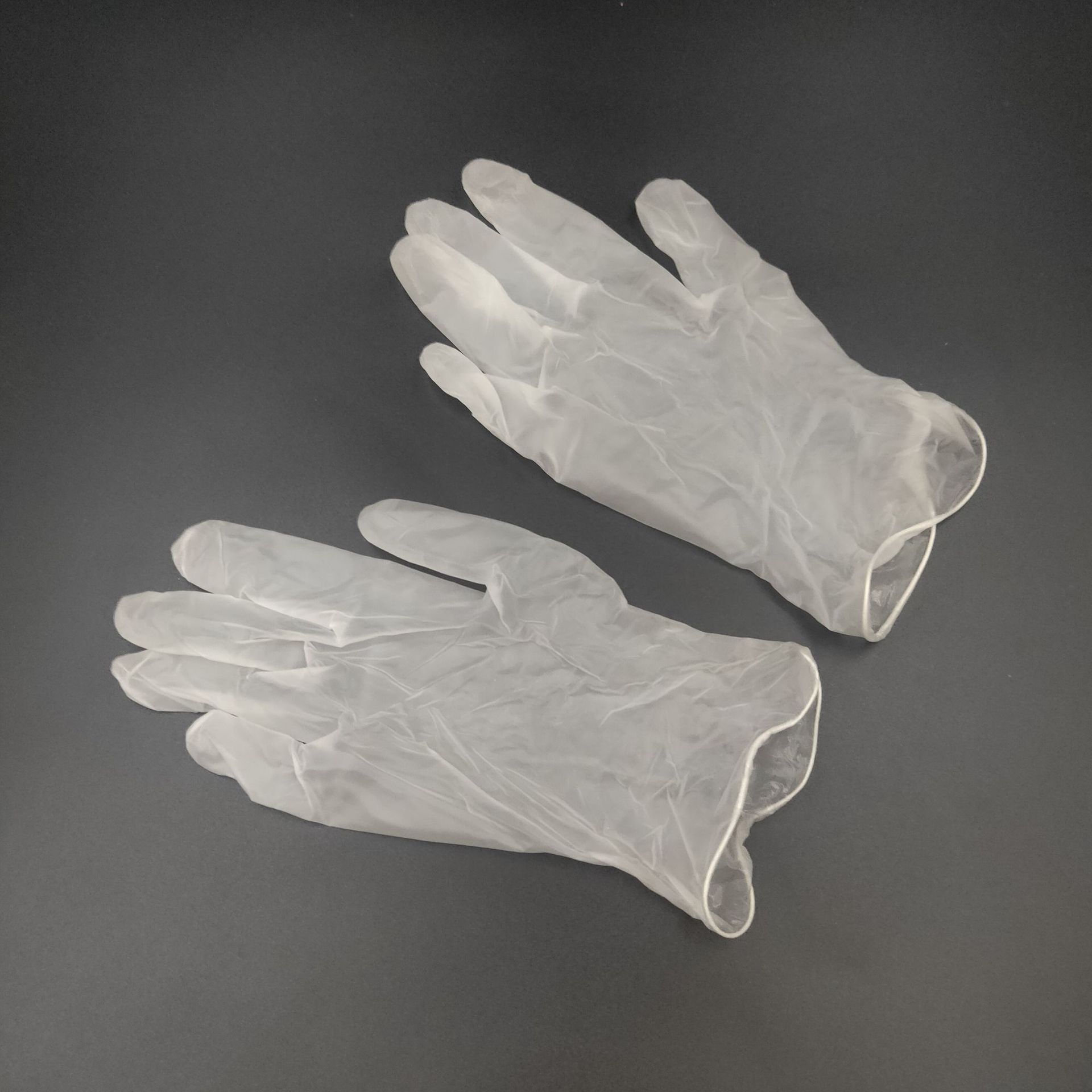 英文出口一次性透明手套医用劳保pvc手套m码100只装盒食品级乳