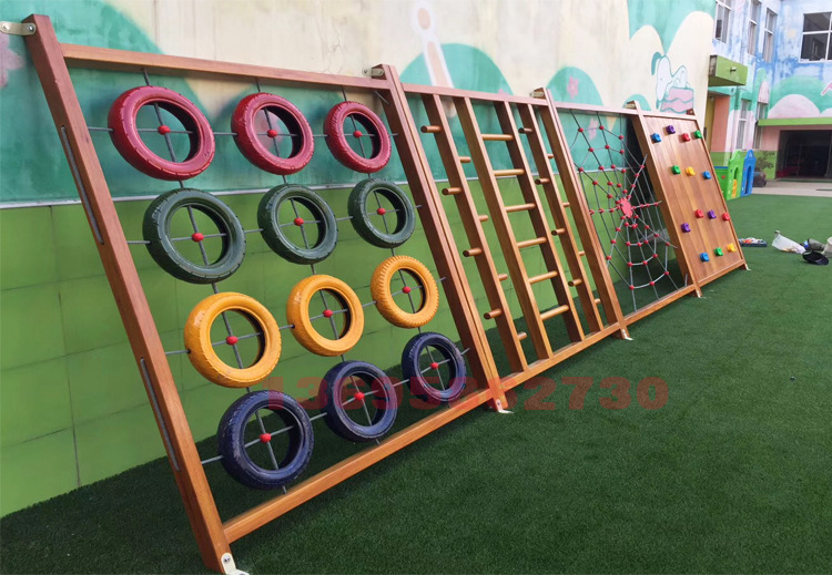 幼儿园户外木质攀爬架儿童蜘蛛网攀爬墙轮胎组合体能训练攀岩墙